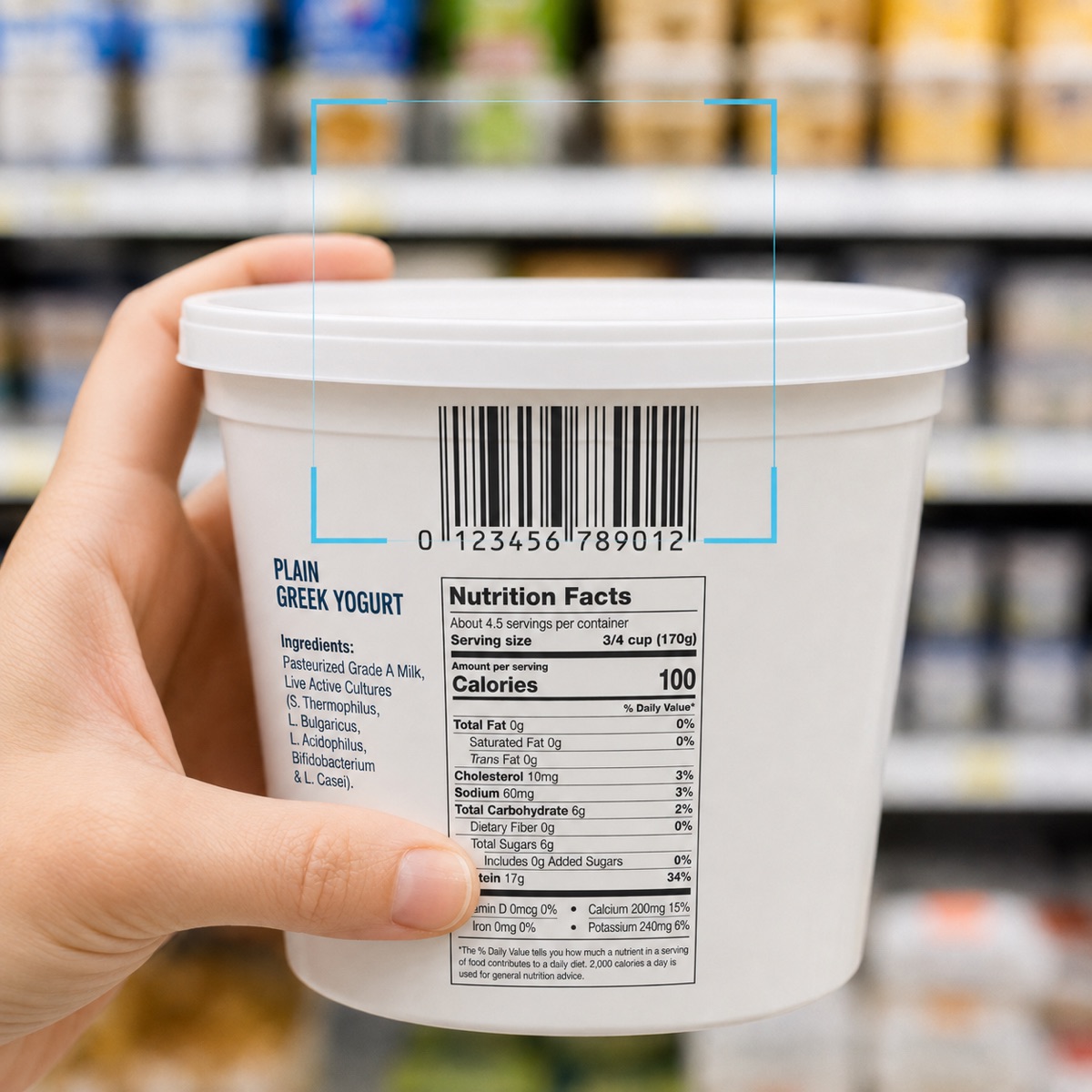A hand holding a plain Greek yogurt tub in a grocery aisle, with a scan frame around its barcode and the nutrition facts panel visible